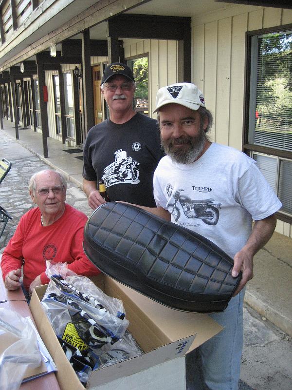 Mike Poteet donating T140 seat for the raffle bike.JPG